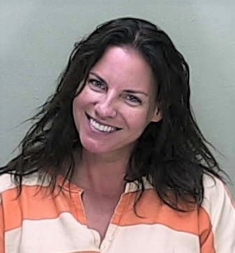 Ocala woman notorious for grinning mugshot back in jail after judge revokes bond