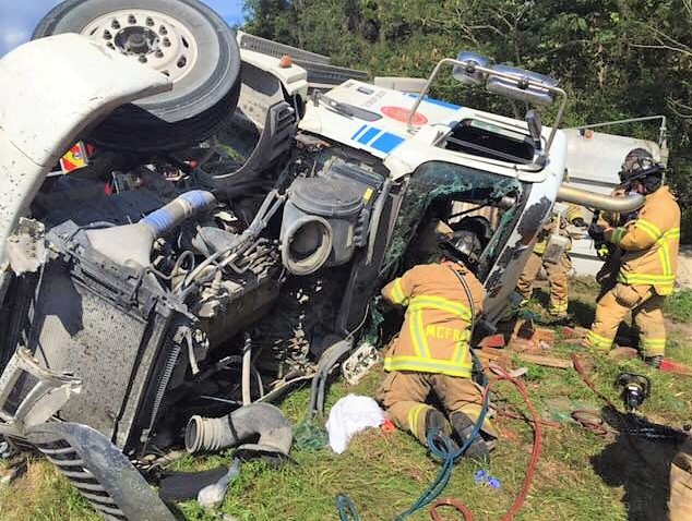 Driver extricated from wreckage after semi overturns on Marion County roadway