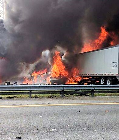 Seven dead after fiery I-75 crash involving semis and passenger van