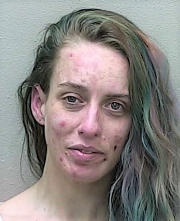 Woman stopped for tape-covered rear window lands behind bars on drug charges
