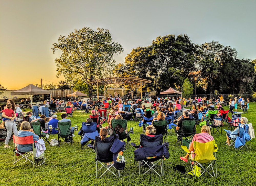A large crowd enjoyed the sounds of Simply Three at Tuscawilla Art Park