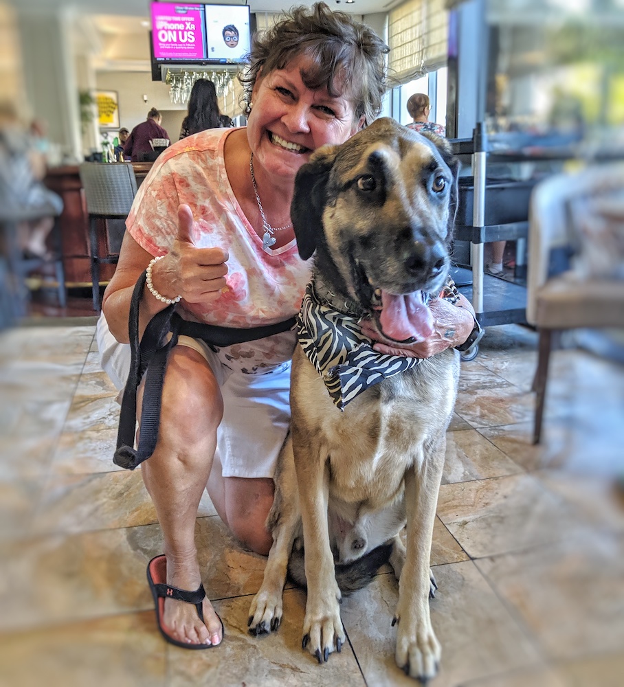Oakley, 7, with owner Addie Clow, a teacher at Hillcrest