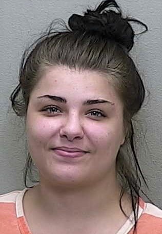 Gun-toting Ocala woman jailed after distraught neighbor takes photos and calls for help