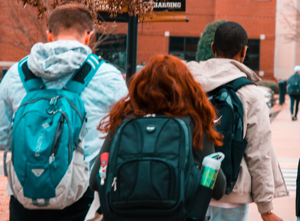 Backpacks on students