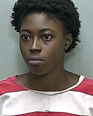Ocala woman accused of hitting man with car and fighting deputies