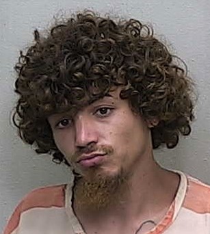 Homeless man facing trespassing charge after chatting with friends on Ocala street