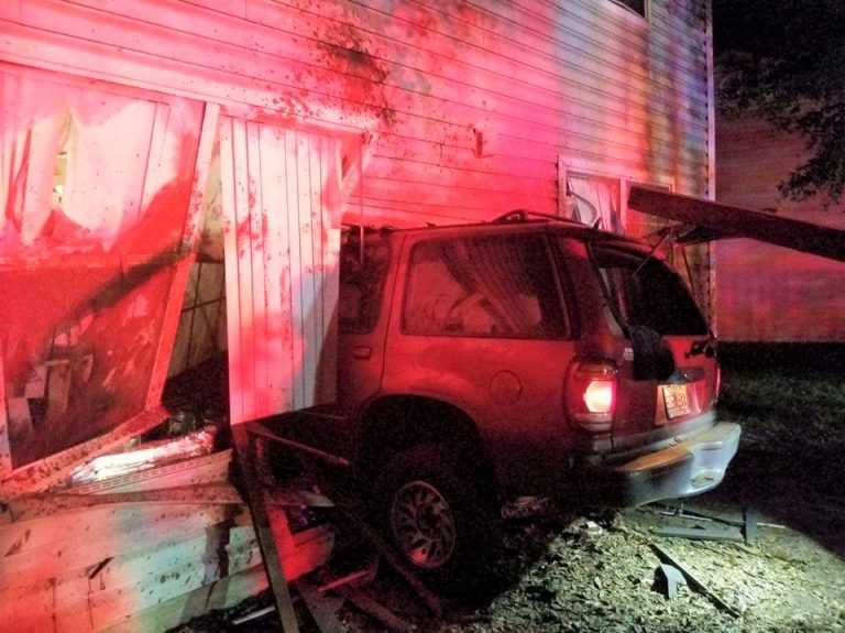 SUV crashes into building and comes to rest partially inside Ocala apartment