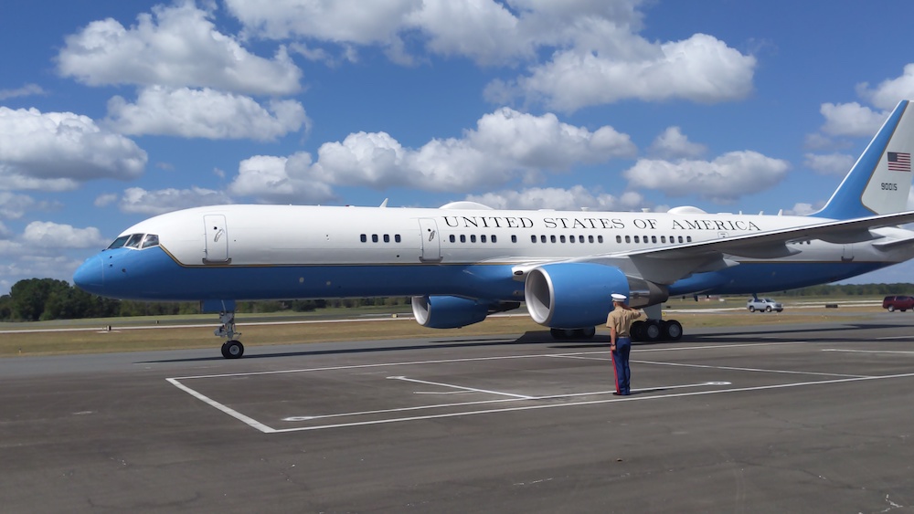 A Marine salutes Air Force Two as it pulls into Ocala International Airport