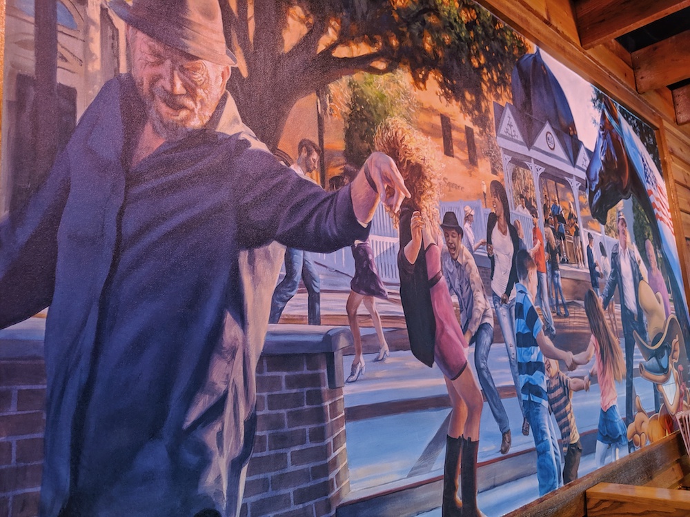 A mural showcasing downtown Ocala is painted on one of the walls of the new Texas Roadhouse at Paddock Mall