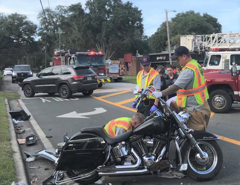 Two trauma-alerted to Ocala hospital after SUV and motorcycle collide