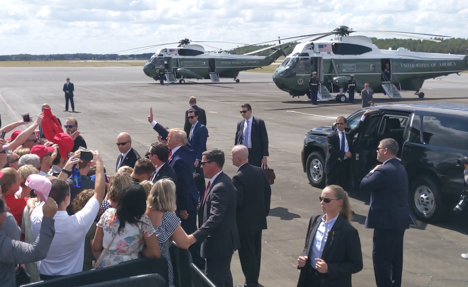 President Trump waves goodbye before boarding Marine One