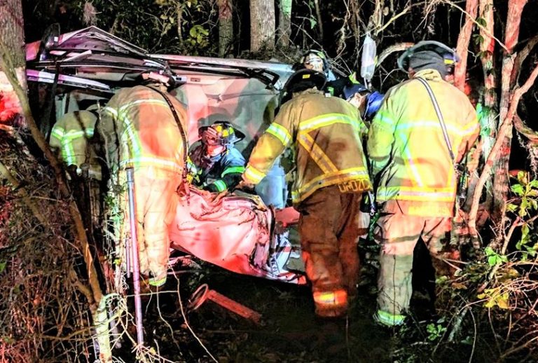 Driver trapped in wreckage on I-75 after vehicle goes airborne and slams into trees