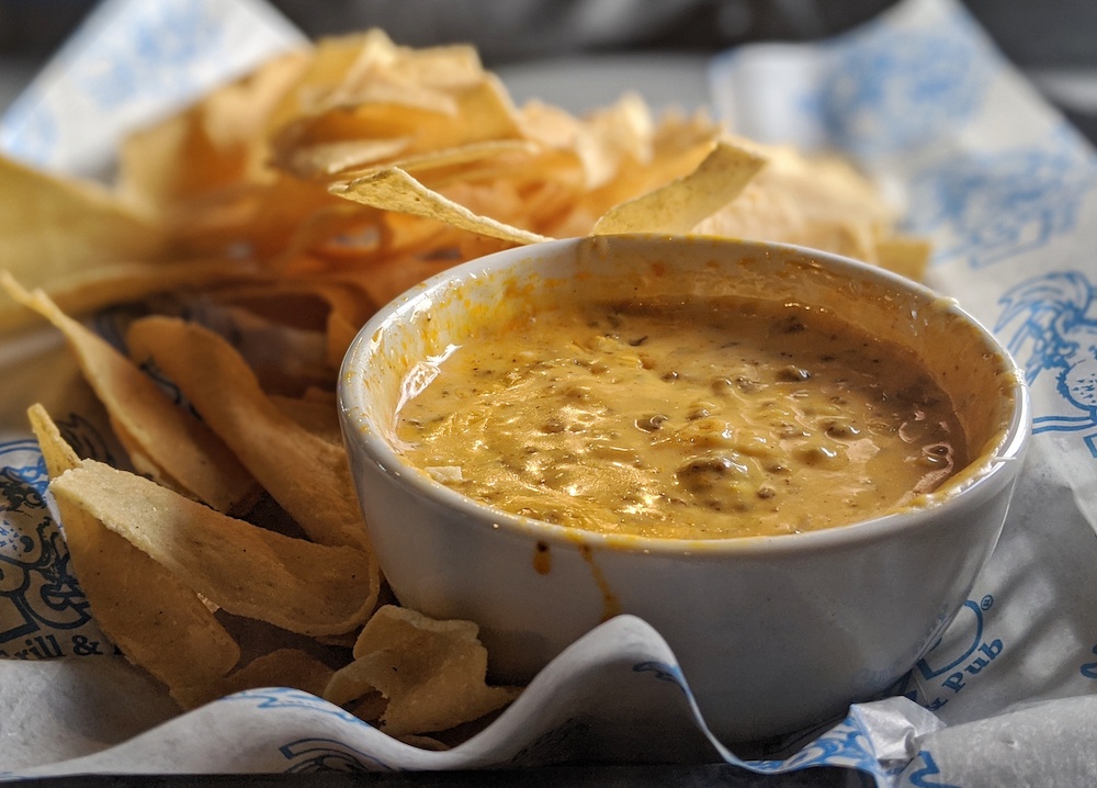 Queso with chorizo and chips at Locos Grill & Pub