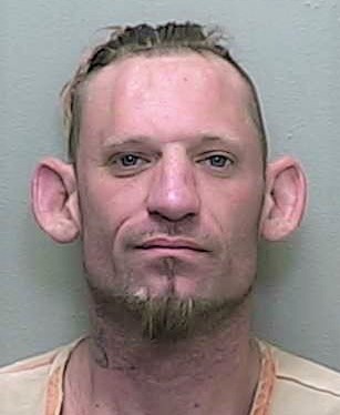 Dog-bitten career criminal joins gal pal and Ocala man behind bars after trio flees from burglarized home