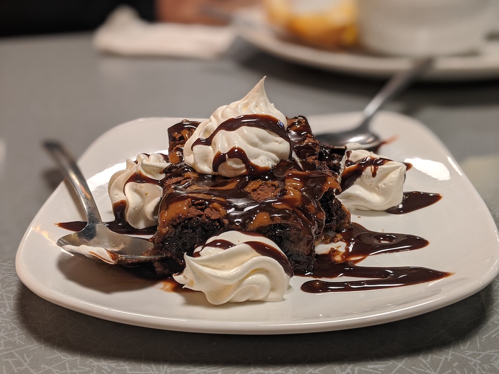 Salted caramel brownie with whipped cream at Locos Grill & Pub