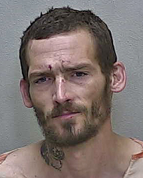 Homeless man caught prowling outside Belleview home