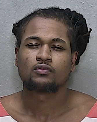 Ocala man jailed on drug and gun charges after running red light