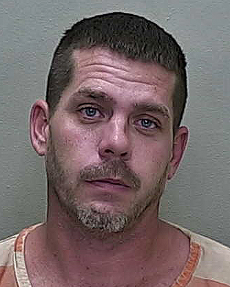 Fort McCoy man with domestic abuse record charged with strangling woman