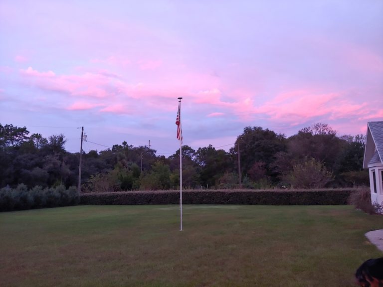 Beautiful Sunset And Flag In Crystal River
