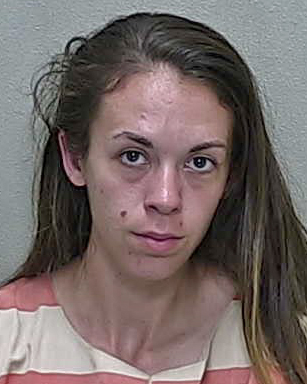 Dunnellon woman caught sleeping with guns and drugs in running vehicle