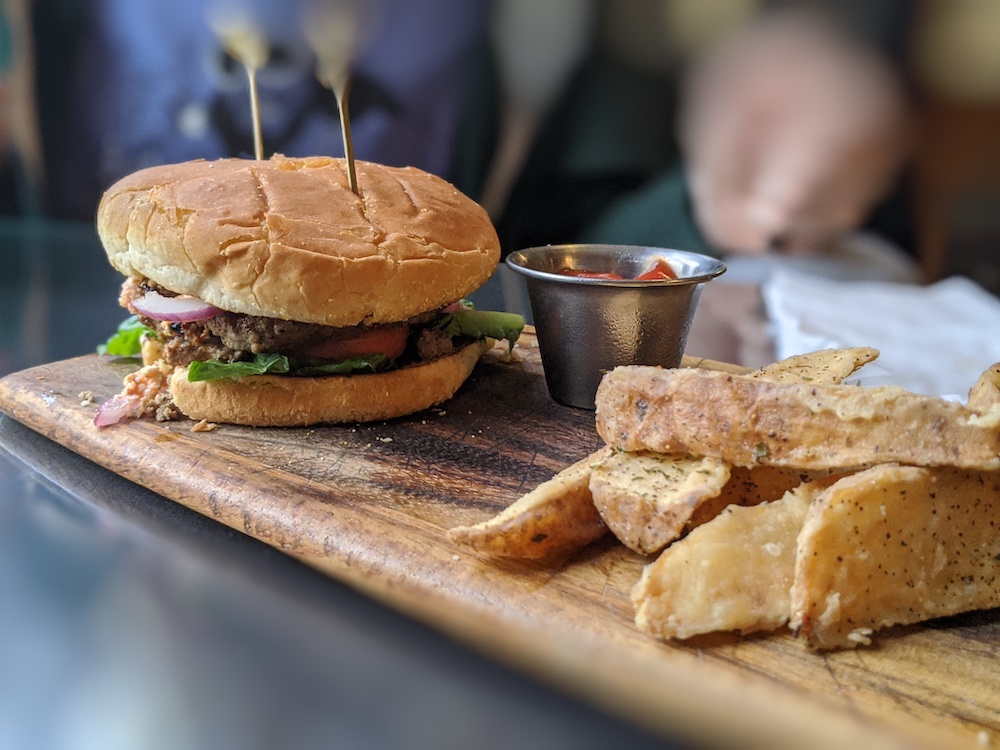 Lamb burger with fries at Feta Mediterranean