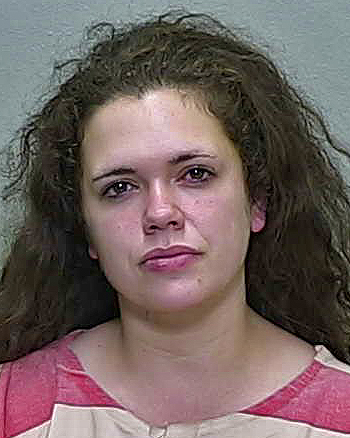 Gun-toting Ocala woman accused of tossing woman to ground by hair
