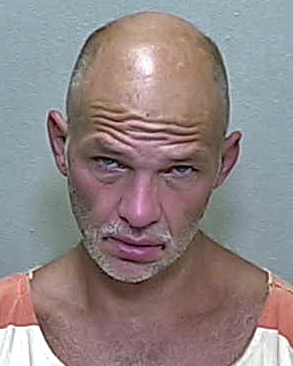 Ocklawaha man charged with making threats and throwing blood-soaked towel