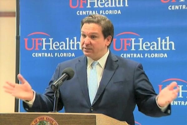 DeSantis at odds with government leaders as COVID-19 cases rise rapidly