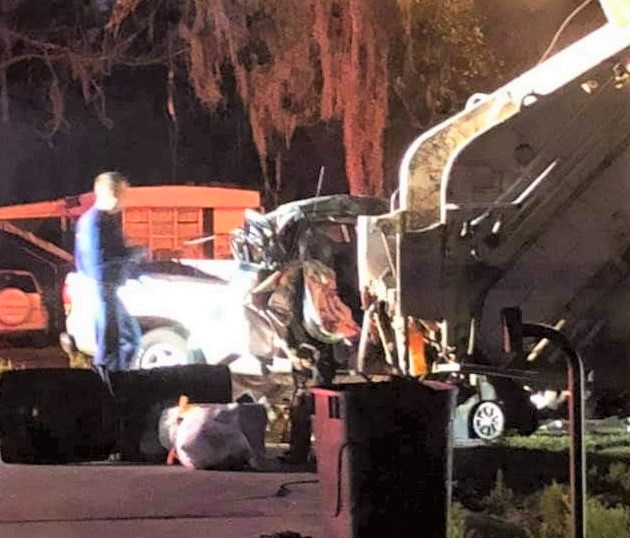 Toddler and 41-year-old man killed when pickup slams into garbage truck