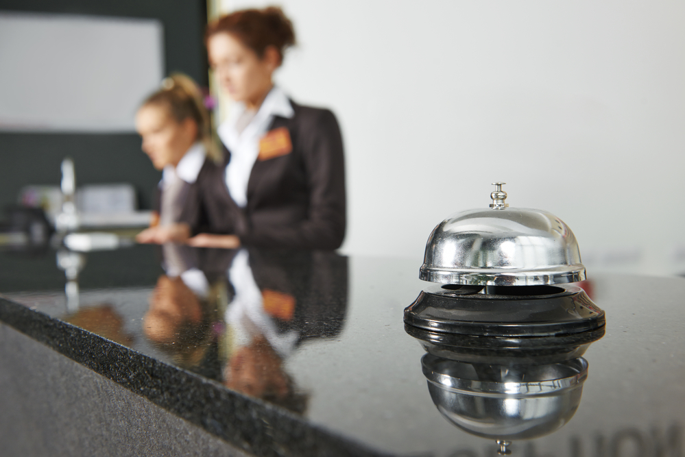 Hotel clerks at front desk