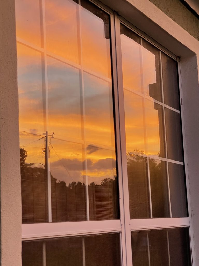 Reflection Of Sunset In Ocala Window
