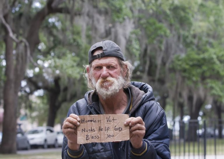 Homeless man asking for charity
