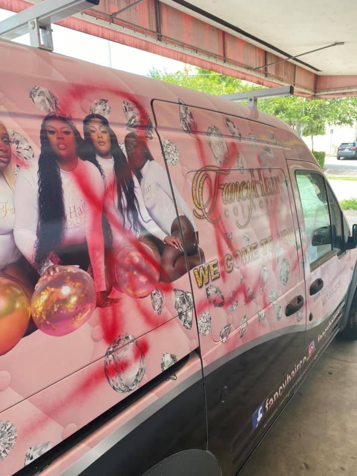 KKK Spray painted on vehicle in Ocala