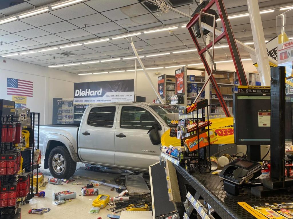 Pickup truck crashes drives 25 feet into Advance Discount Auto Parts in east Ocala Florida 2
