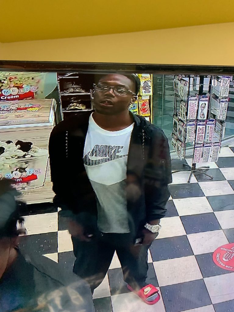 This man is wanted in connection with burglarizing a vehicle using stolen debit cards