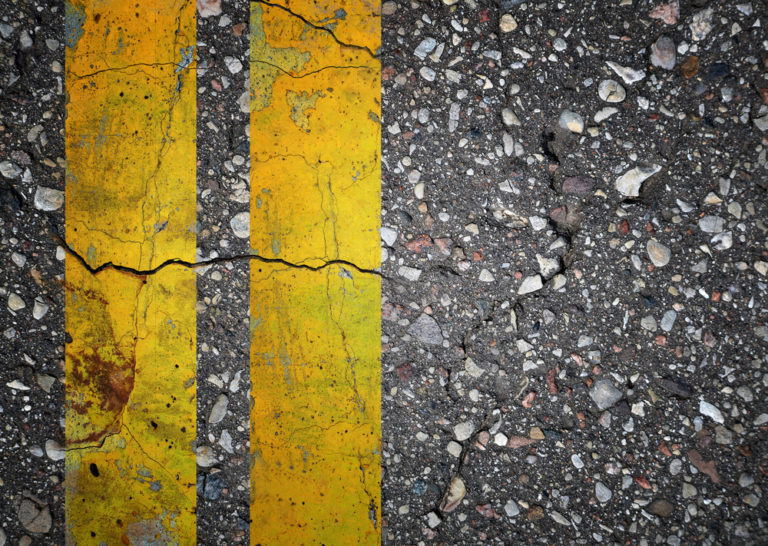 Yellow line on asphalt