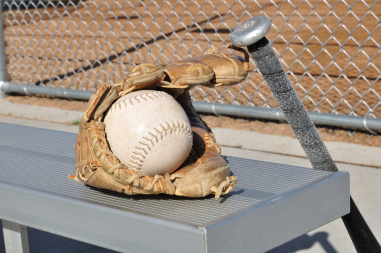softball glove and bat