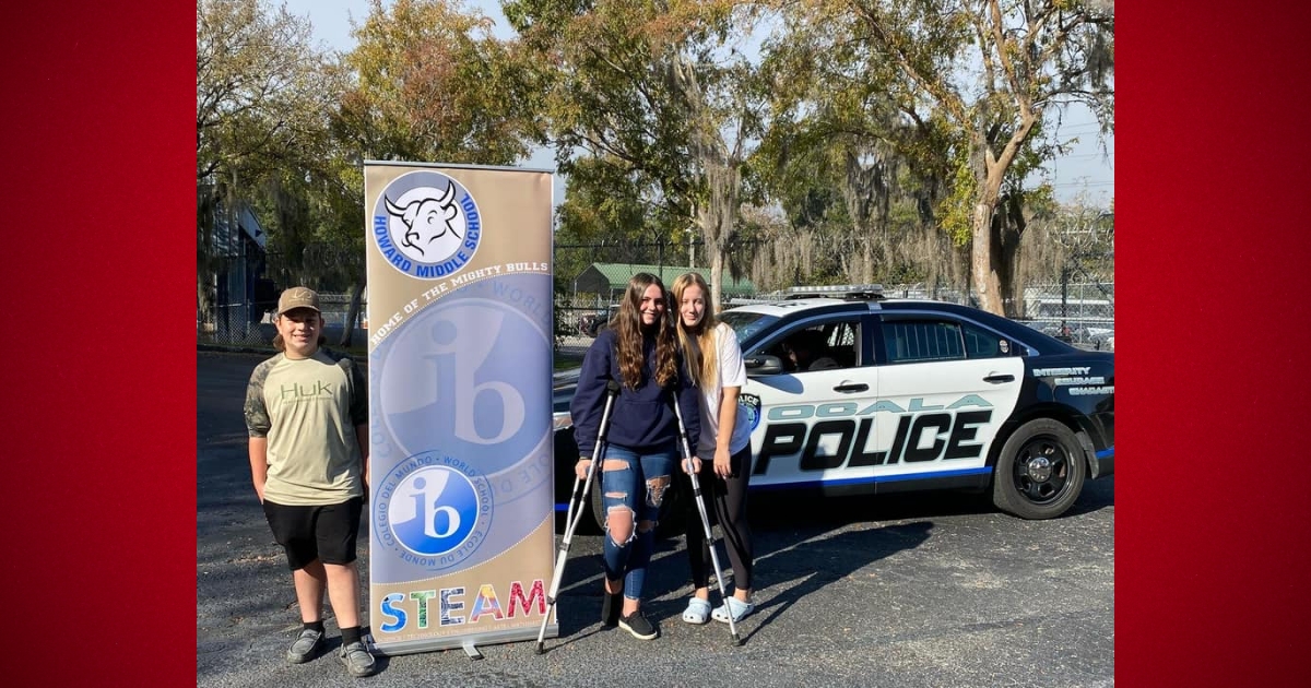 Local middle school students surprise Ocala Police Department with car wash 3