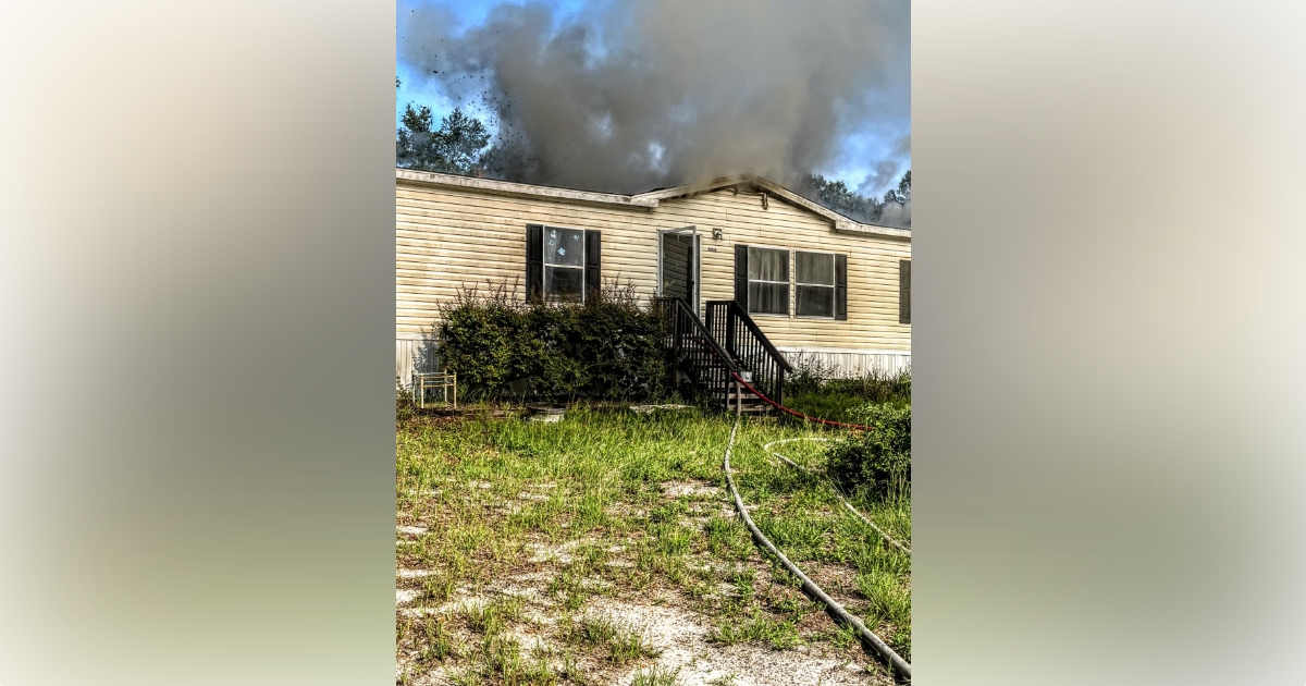 Marion County firefighters battle mobile home fire