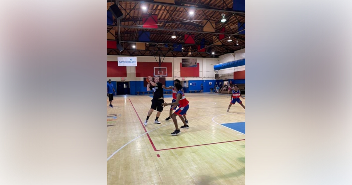 OPD officers participating in 'Hoops & Badges' basketball event