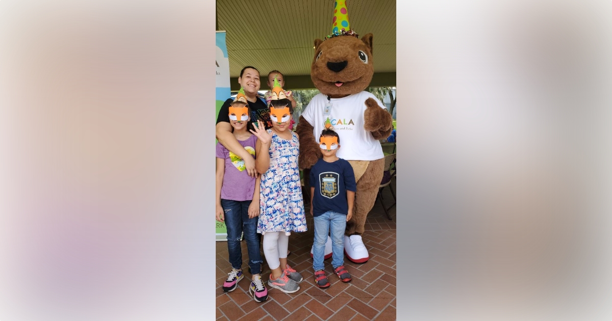 Rex the squirrel meets the local community at a birthday party at Tuscawilla Park 5