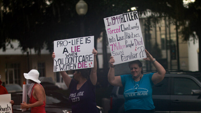 Demonstrators Participating In Women’s Rights Rally At Ocala Downtown Square