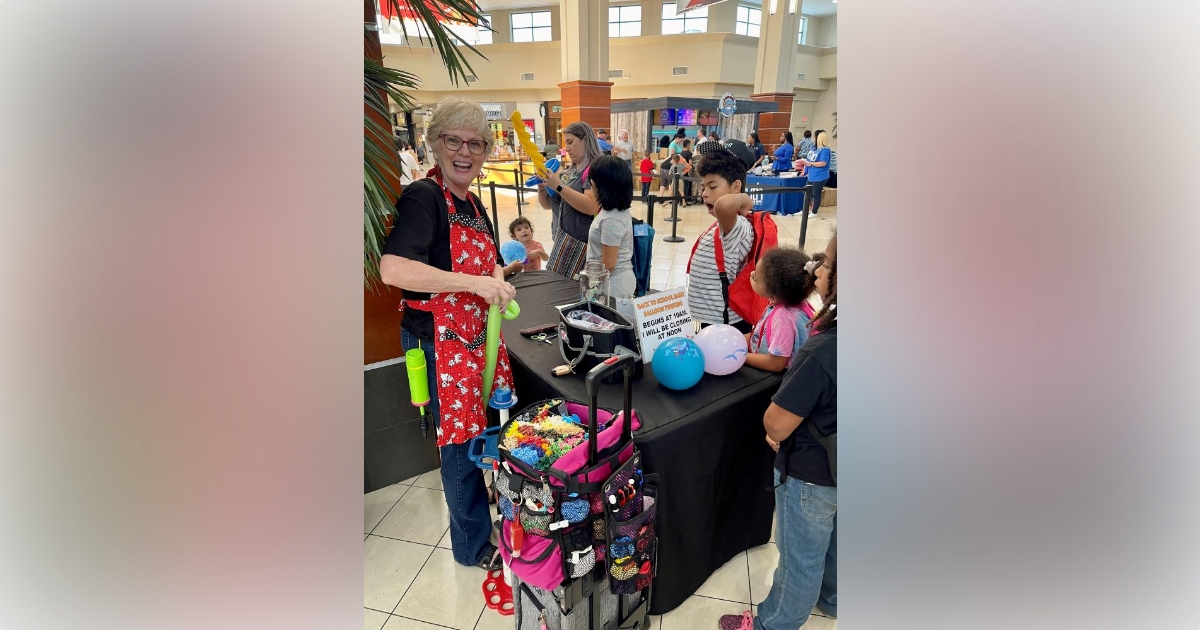 Paddock Mall gives away over 2000 backpacks to local students during back to school event 1