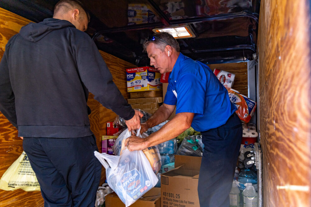 Marion County Facilities Management and MCFR employees load a trailer with supplies to bring to Tri Eagle Sales Photo courtesy of Marion County Marion County Facilities Management and MCFR employees load a trailer with supplies to bring to Tri Eagle Sales Photo courtesy of Marion County