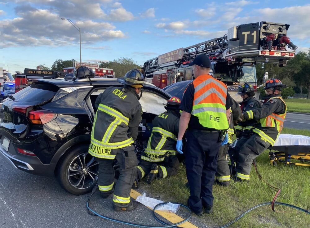 Ocala Fire Rescue crews extricating passenger from SUV following crash on W Silver Springs Boulevard (September 30, 2022)