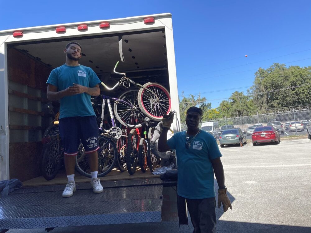 Brother's Keeper loads donated bicycles into truck