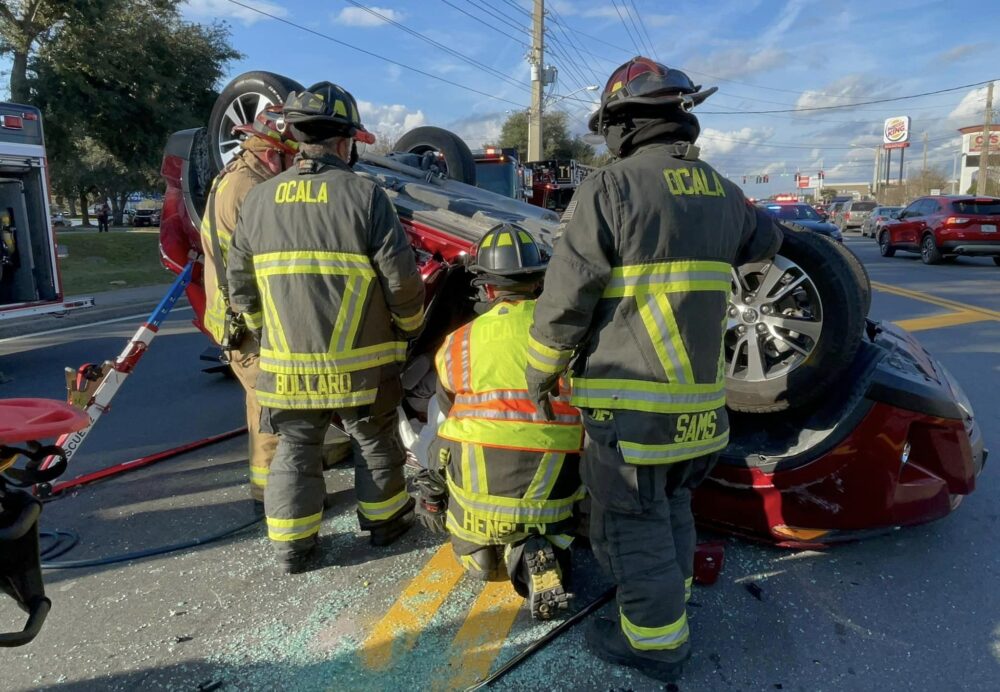 Crash with rollover (December 5, 2022) - Ocala Fire Rescue firefighters extricating driver
