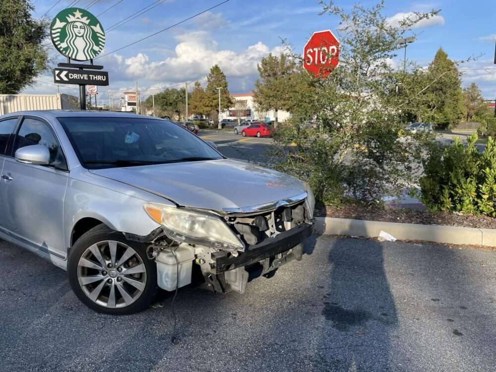 Crash with rollover (December 5, 2022) - silver sedan