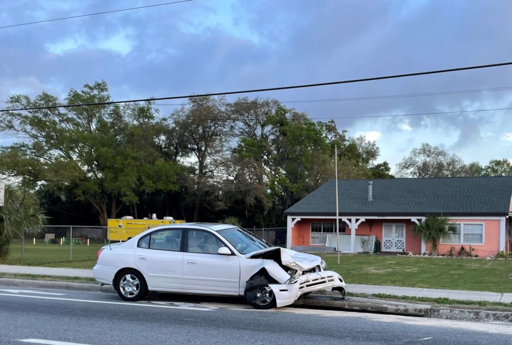 Ocala Fire Rescue responds to two vehicle crash with rollover on February 28, 2023 - photo of sedan