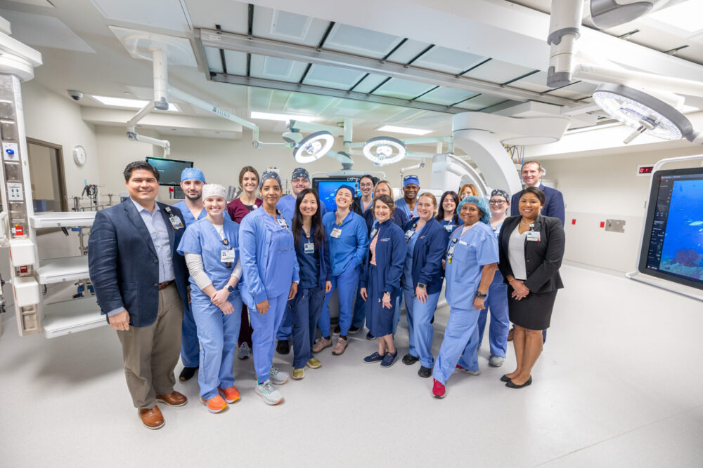 HCA Florida Ocala Hospital new Cardiac Procedural Unit medical staff poses for picture inside facility
